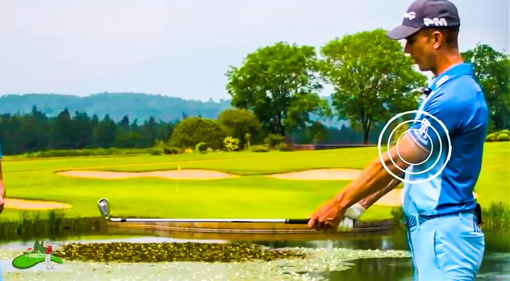 Golfer trying to avoid Water Hazard